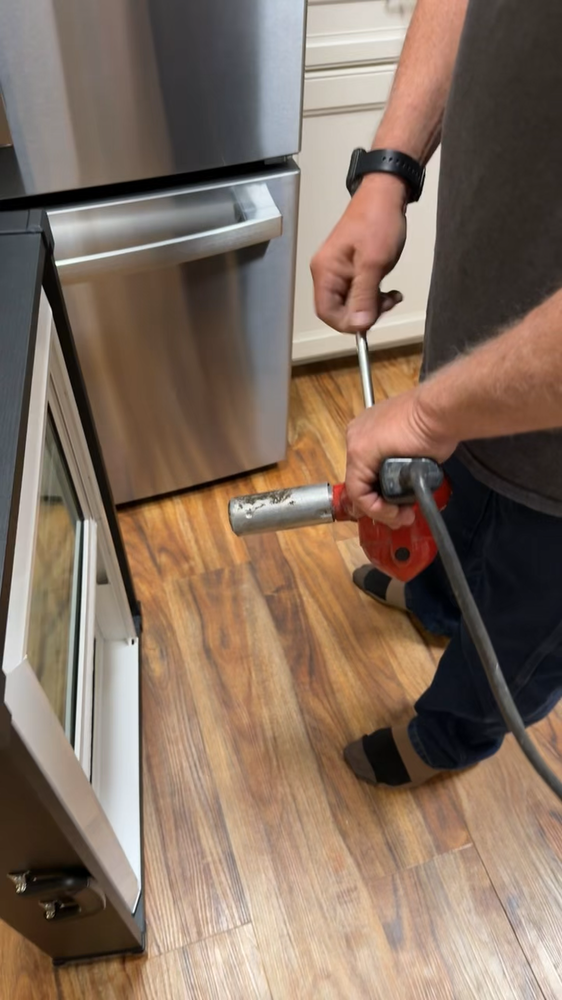 A heat-gun test being performed on a window